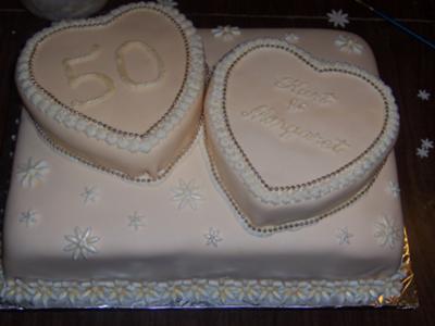 This golden wedding anniversary cake was 2 layers of golden lemon and filled