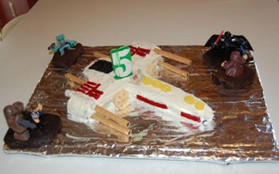 Birthday Cake Decorations on Star Wars X Wing Fighter Cake With Light Saber Dueling Characters